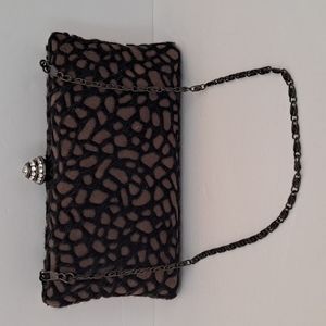 JNB woman's evening bag black and taupe webbed design w/unique blk chai